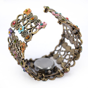 Damen Armreif gold mit Uhr und Applikationen